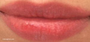 Shiseido Shimmering Rouge OR405 on the lips (picture taken outdoor)
